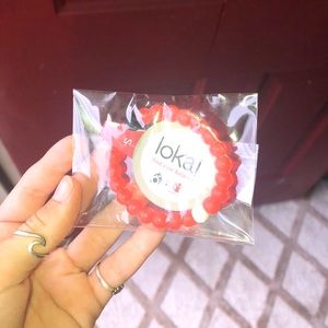 red Lokai bracelet